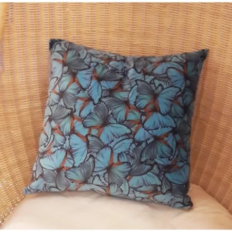 Coussin velours papillons turquoise